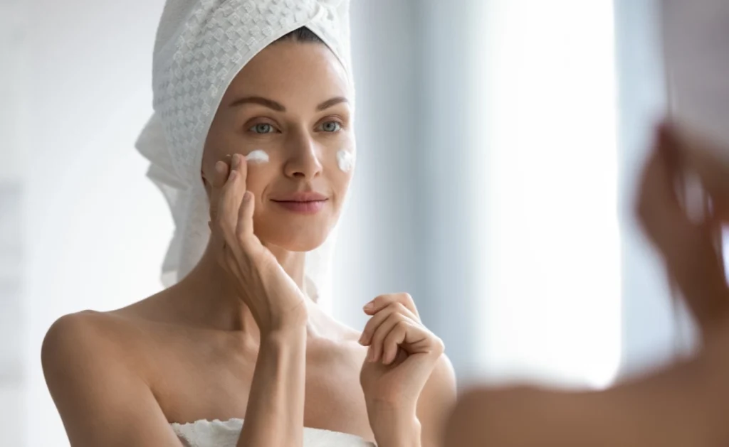 woman doing her skin care routine at home