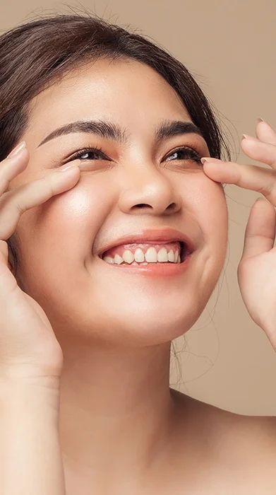 woman touching healthy, rejuvenated skin